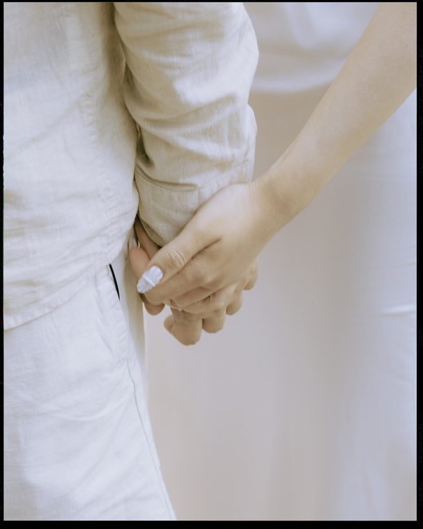 Courtside 15 / Hands held close together