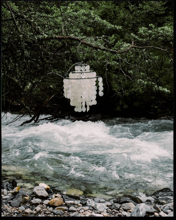 Courtside 17 / Ornament hanging above a river