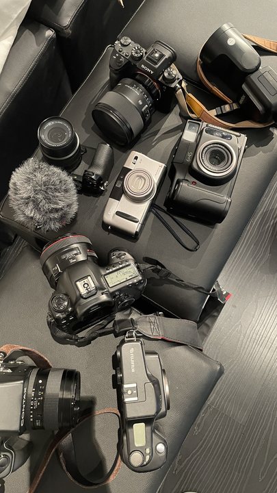 Foreign Body 02 / Camera equipment gathered on a table